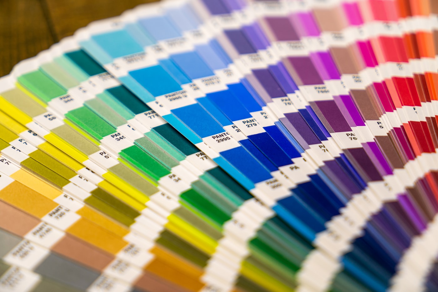 Pantone colour swatch fan deck fanned out, used for precise multi-colour matching