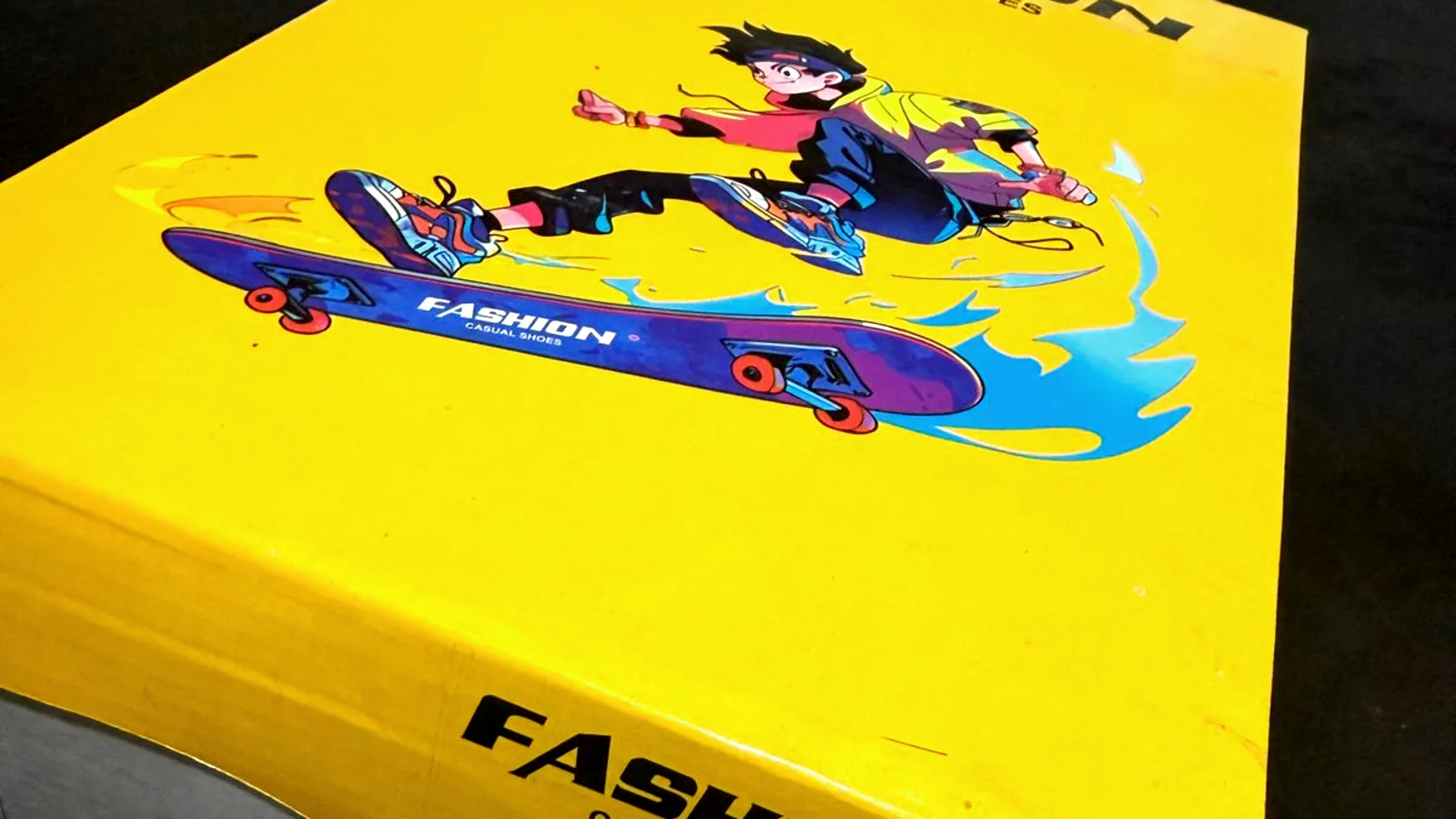 FASHION shoe box with printed skater lid on a dark table